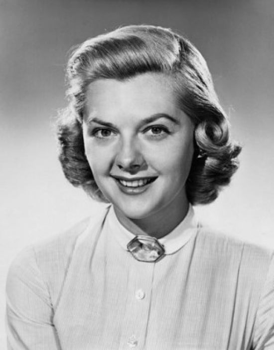 Portrait of a young woman smiling poster print