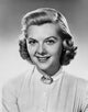 Portrait of a young woman smiling poster print