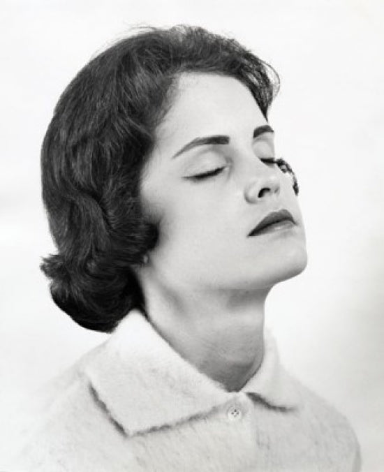 Close-Up of Young Woman with Eyes Closed Poster Print