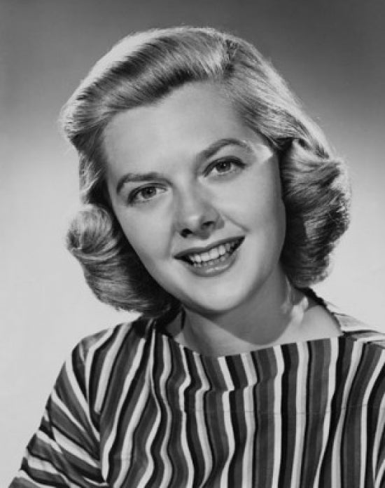 Portrait of a young woman smiling poster print