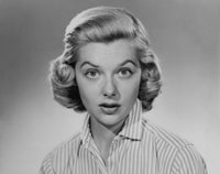 Portrait of a young woman looking surprised poster print.
