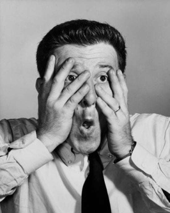 Close-up of a businessman looking shocked poster print.