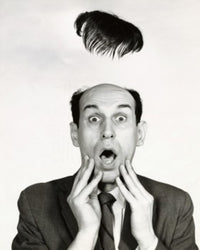 Poster print of a surprised businessman with a flying toupee.