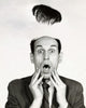 Poster print of a surprised businessman with a flying toupee.