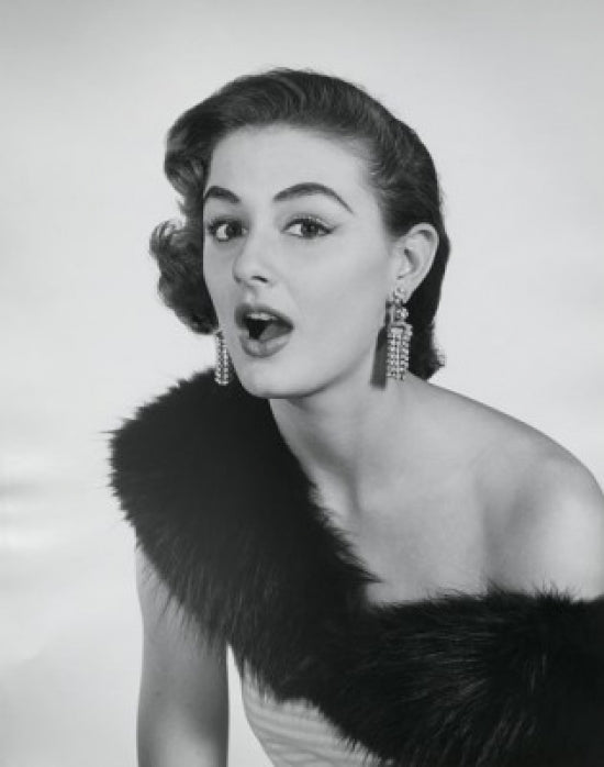 Surprised Young Woman Poster Print showcasing a young woman's astonished expression.