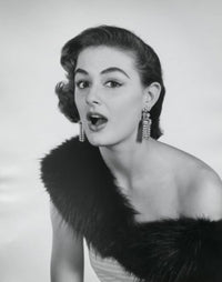 Surprised Young Woman Poster Print showcasing a young woman's astonished expression.