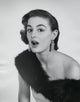 Surprised Young Woman Poster Print showcasing a young woman's astonished expression.