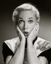 Surprised mid adult woman poster print showcasing genuine emotion.