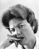 Portrait of a mature woman biting nails poster print