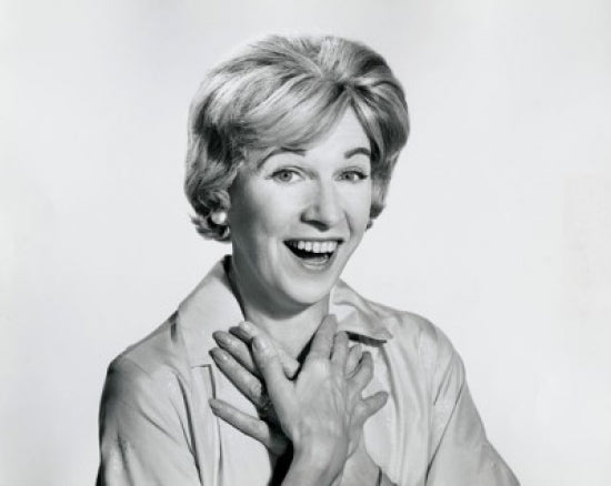 Portrait of a mid adult woman laughing poster print