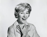 Portrait of a mid adult woman laughing poster print