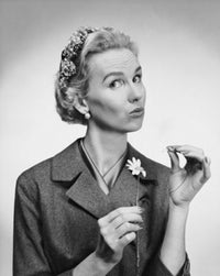 Portrait of a Mid Adult Woman Picking Petals from a Flower Poster Print