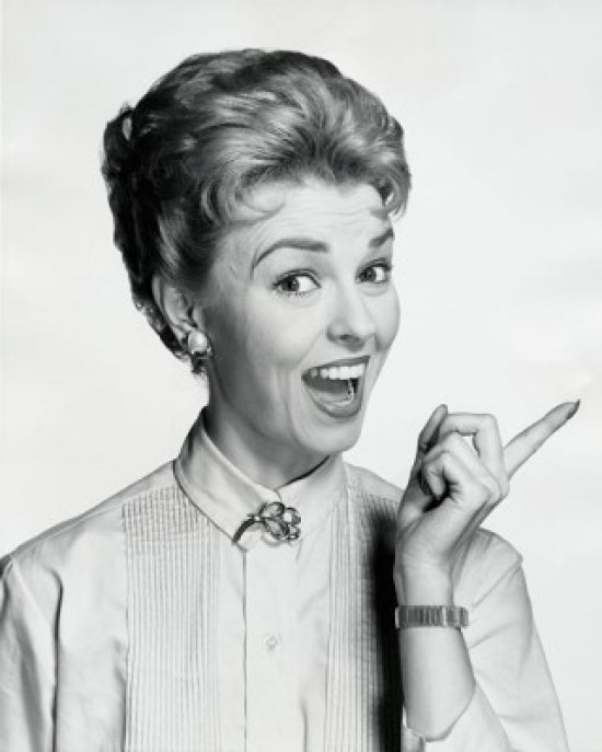 Portrait of a Mid Adult Woman Pointing Sideways Poster Print