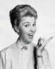 Portrait of a Mid Adult Woman Pointing Sideways Poster Print