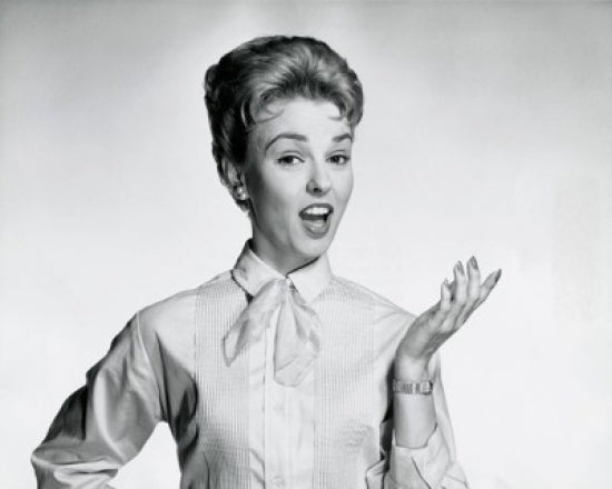Portrait of a Mid Adult Woman Gesturing Poster Print on premium paper