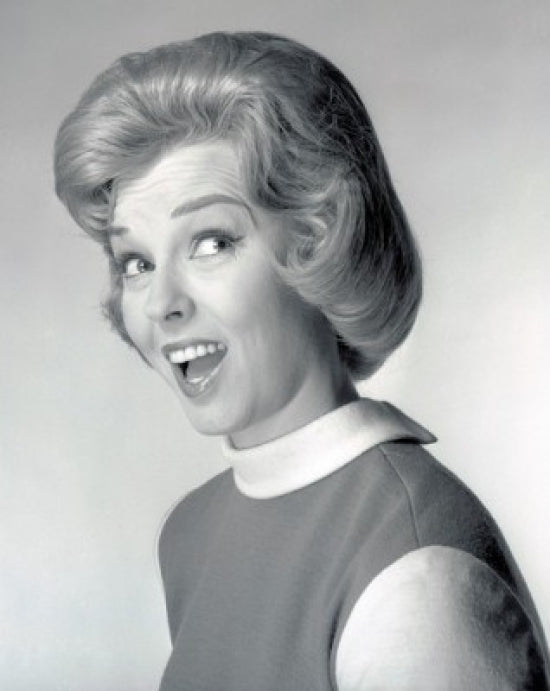 Woman smiling over shoulder poster print, vibrant and cheerful artwork.