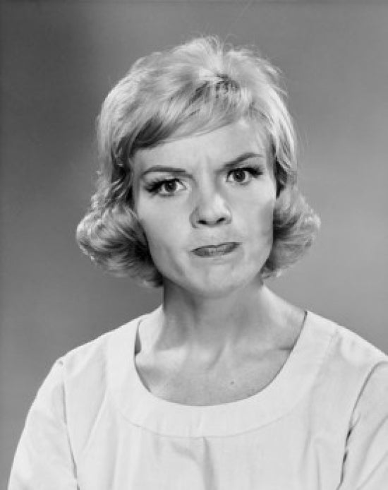 Portrait of a mid adult woman looking frustrated - Poster Print