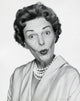 Portrait of a mid adult woman puckering her lips poster print