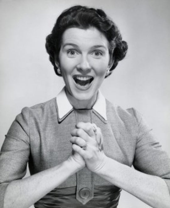 Portrait of a surprised mid-adult woman with clasped hands poster print
