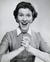 Portrait of a surprised mid-adult woman with clasped hands poster print