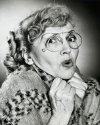 Portrait of a Senior Woman Looking Scared Poster Print showcasing emotional depth and expression.