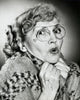 Portrait of a Senior Woman Looking Scared Poster Print showcasing emotional depth and expression.