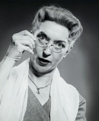 Portrait of a senior woman adjusting her eyeglasses, poster print.