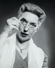 Portrait of a senior woman adjusting her eyeglasses, poster print.