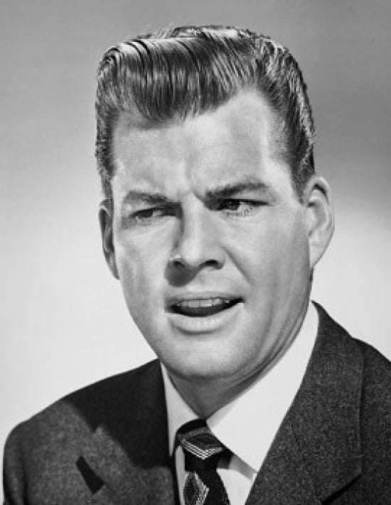 Close-up poster print of a frustrated businessman, perfect for office decor.