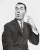 Portrait of a businessman pointing at himself Poster Print