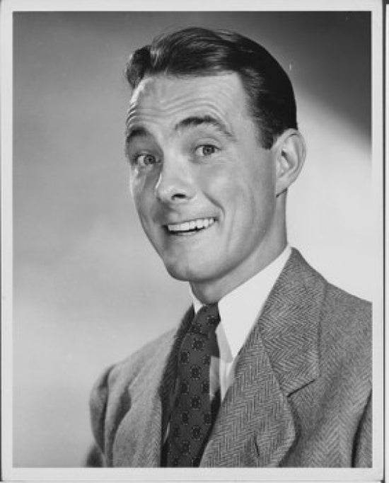 Portrait of a businessman smiling with wide open eyes poster print.