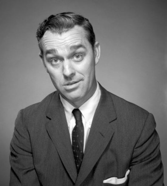 Studio portrait of businessman frowning poster print.