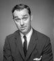 Studio portrait of businessman frowning poster print.