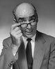 Portrait of a businessman adjusting his eyeglasses poster print.