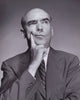 Serious Businessman Poster Print showcasing a focused businessman in a thoughtful pose