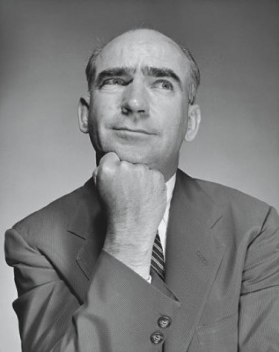 Close-up of a businessman with hand on chin poster print