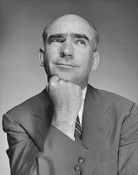 Close-up of a businessman with hand on chin poster print