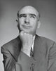 Close-up of a businessman with hand on chin poster print