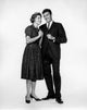 Business Couple Smiling Poster Print showcasing a joyful moment between partners.
