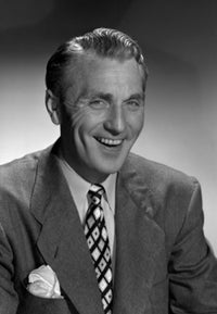 Poster print of a smiling businessman in a studio portrait.