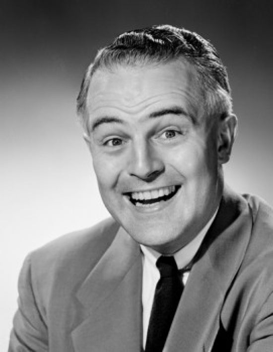 Studio portrait of a businessman laughing poster print.