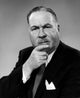Studio Portrait of Businessman with Hand on Chin Poster Print