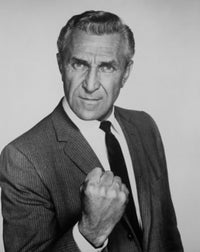 Portrait of a Senior Man Showing His Fist Poster Print on premium paper.