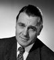 Studio Portrait of Serious Businessman Poster Print on premium paper.