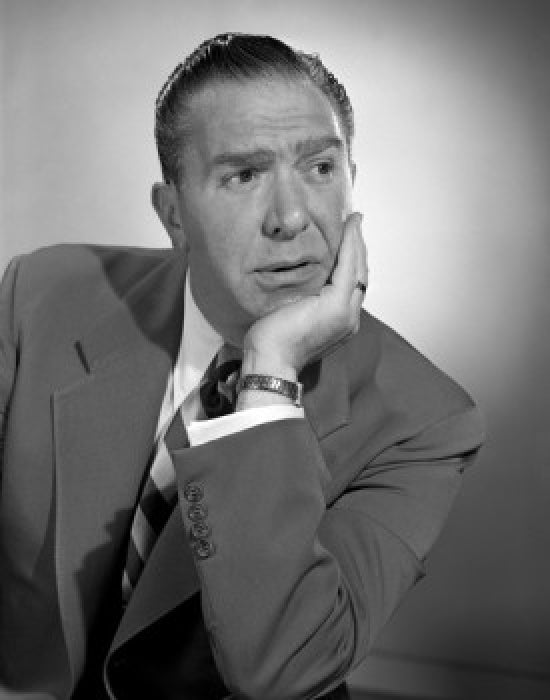 Pensive Businessman with Hand on Chin Poster Print
