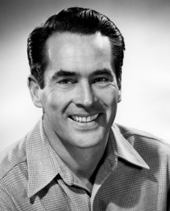 Studio portrait of a smiling man poster print.