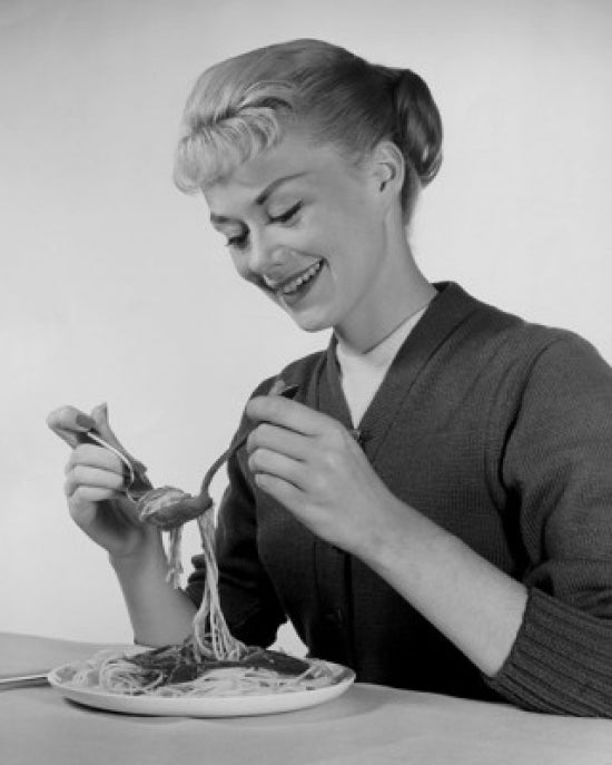 Young Woman Eating Spaghetti Poster Print