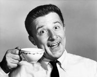 Portrait of a mature man holding a tea cup poster print.