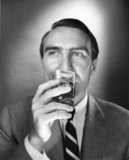 Close-up poster print of a mature man drinking, capturing a moment of reflection.