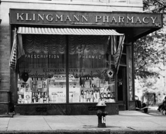 Facade of a Pharmacy Store Poster Print showcasing vintage architecture.